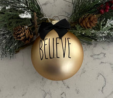 Load image into Gallery viewer, Rae Dunn Inspired Ornaments - Gold Ornament with Black Letters and Black Bow
